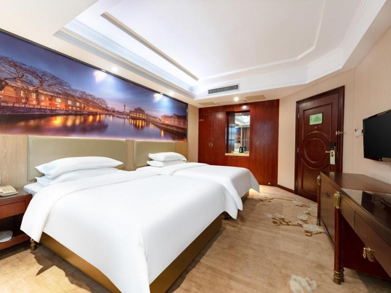 Vienna Hotel Shenzhen Songgang Shajiang Road Bagian luar foto