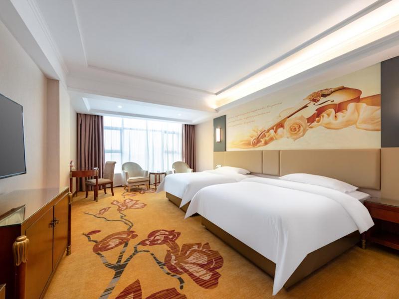 Vienna Hotel Shenzhen Songgang Shajiang Road Bagian luar foto