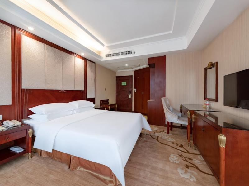 Vienna Hotel Shenzhen Songgang Shajiang Road Bagian luar foto