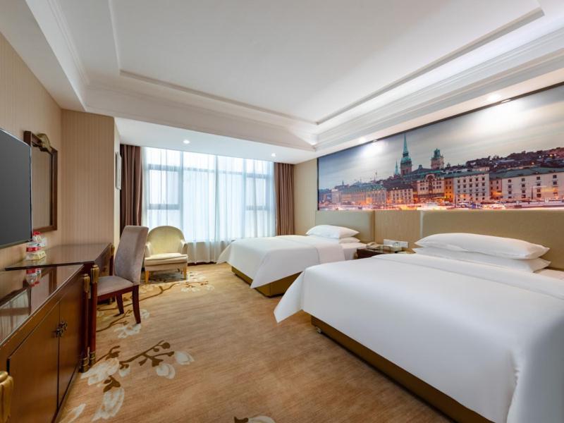 Vienna Hotel Shenzhen Songgang Shajiang Road Bagian luar foto